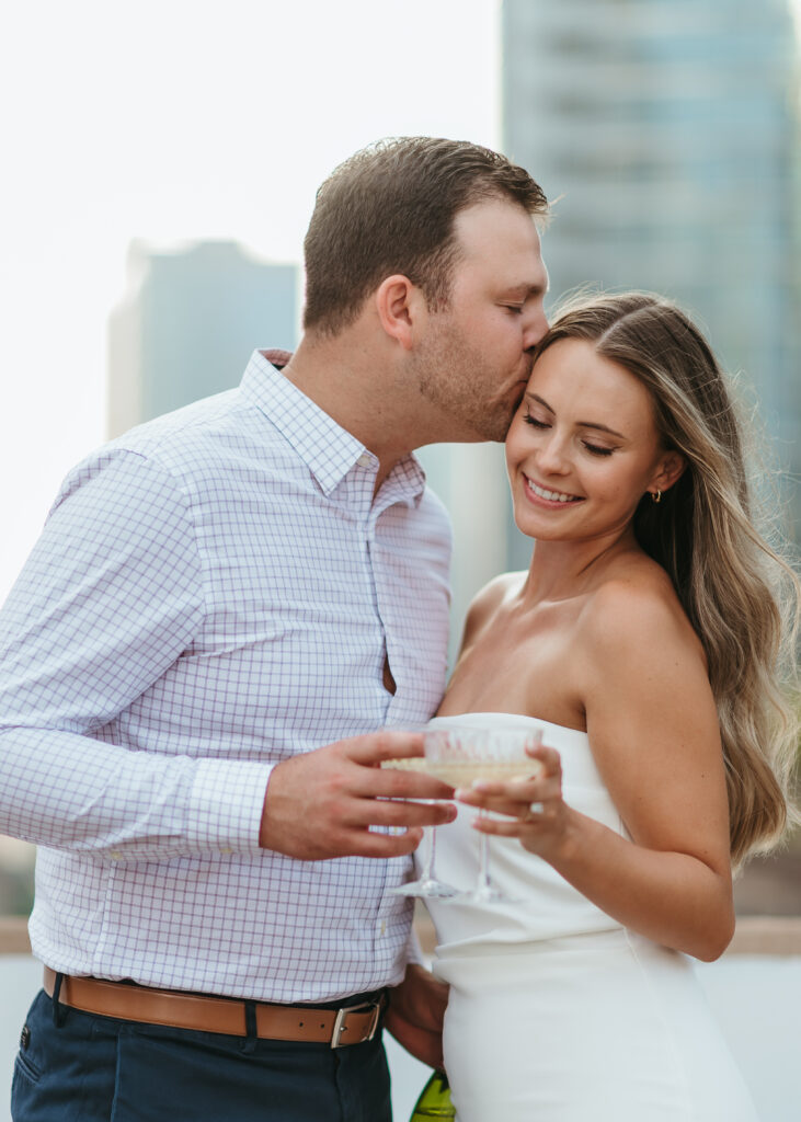 downtown austin rooftop engagement photo